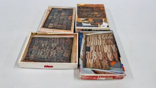 4 X BOXES CONTAINING A QUANTITY OF VINTAGE WOODEN PRINTING BLOCKS.