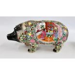 A LARGE CERAMIC PIG IN THE CHINESE FAMILLE ROSE DESIGN, L 46CM.