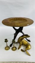 A PERSIAN INSPIRED BRASS TRAY TABLE WITH FOLDING WOODEN LEGS DIAM.