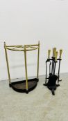 A VINTAGE STYLE BRASS AND CAST STICK / UMBRELLA STAND ALONG WITH A FIRESIDE SET.