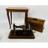 A VINTAGE "JONES" 417183 SEWING MACHINE IN A FITTED WOODEN CASE ALONG WITH AN INLAID SEWING TABLE