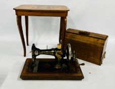 A VINTAGE "JONES" 417183 SEWING MACHINE IN A FITTED WOODEN CASE ALONG WITH AN INLAID SEWING TABLE
