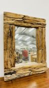 AN IMPRESSIVE DRIFT WOOD FRAMED MIRROR, 71CM X 91CM.