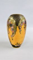 A CROWN DEVON ART DECO VASE DEPICTING STYLIZED TREES AGAINST AN ORANGE GROUND 2074 - H 21CM.