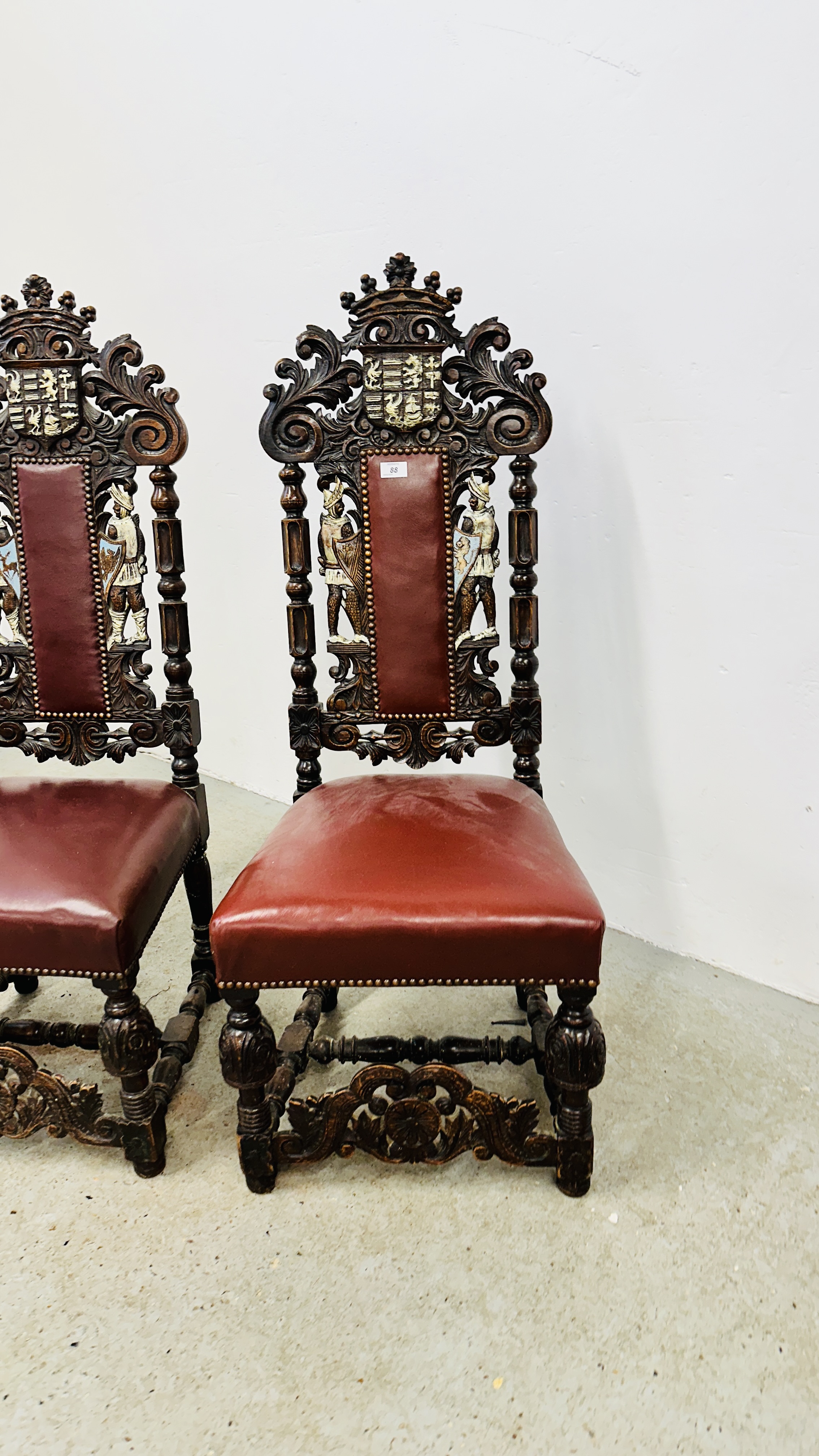 A SET OF 4 OAK FRAMED DINING CHAIRS WITH HEAVILY CARVED DETAIL BEARING CREST AND TWO KNIGHTS, - Image 2 of 12