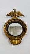 A VINTAGE EAGLE CRESTED CONVEX ROUND MIRROR - H 41CM.