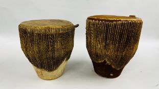 2 AFRICAN SKIN DRUMS WITH BEATERS, EACH HEIGHT APPROX 40CM, DIAMETER 34CM.