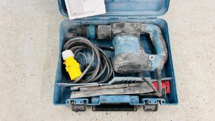 A MAKITA HK1820 110 VOLT POWER SCRAPER IN CARRY CASE WITH ACCESSORIES - SOLD AS SEEN.