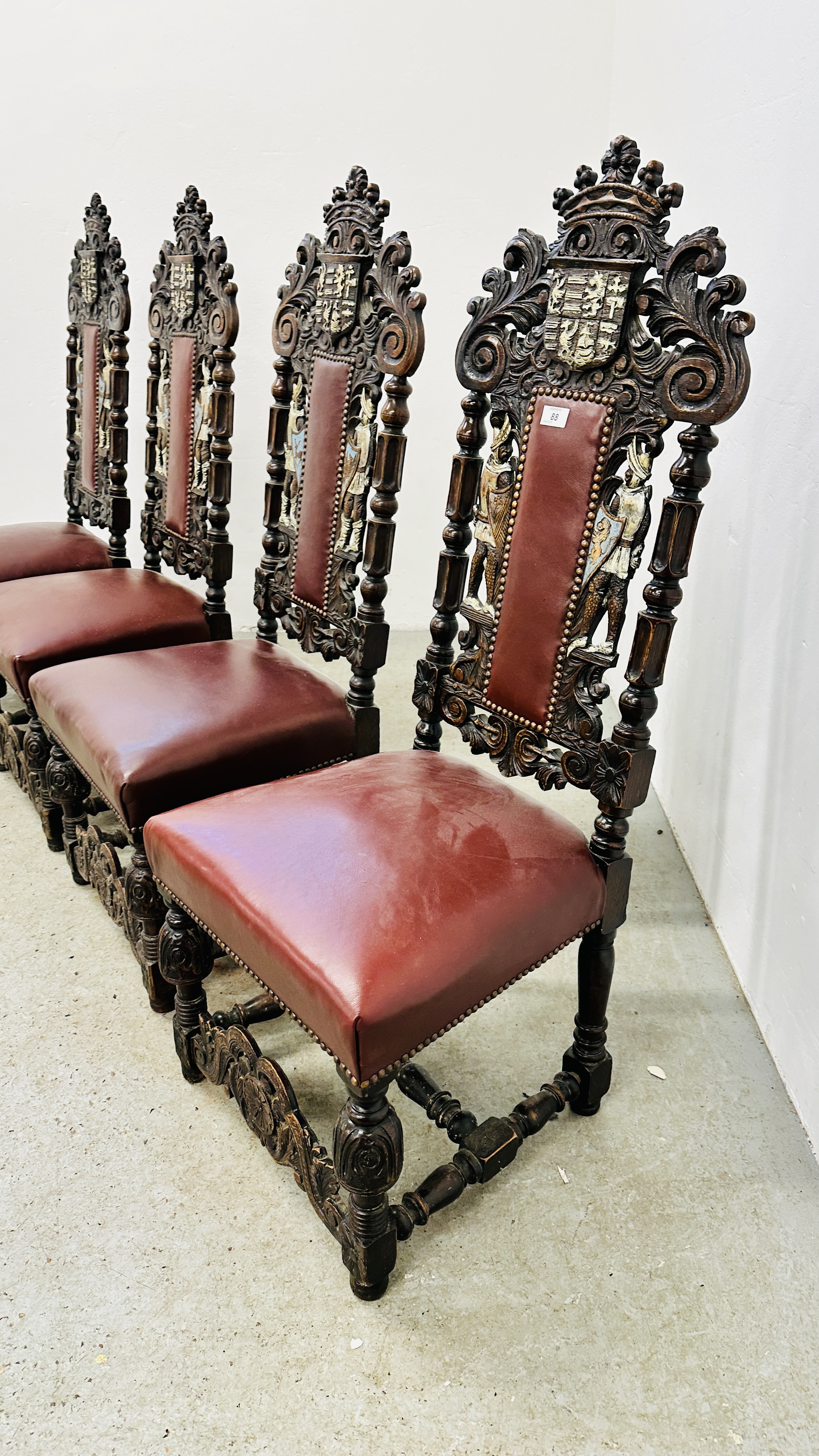 A SET OF 4 OAK FRAMED DINING CHAIRS WITH HEAVILY CARVED DETAIL BEARING CREST AND TWO KNIGHTS, - Image 3 of 12