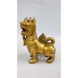 AN ELABORATE CARVED WOODEN FOO DOG STUDY, GILT FINISH, H 44CM X W 33CM.