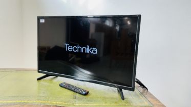 TECHNIKA 32 INCH TELEVISION WITH REMOTE - SOLD AS SEEN.