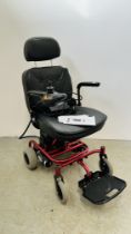 A SHOPRIDER VIENNA POWERED MOBILITY CHAIR COMPLETE WITH INSTRUCTIONS AND CHARGER - SOLD AS SEEN.