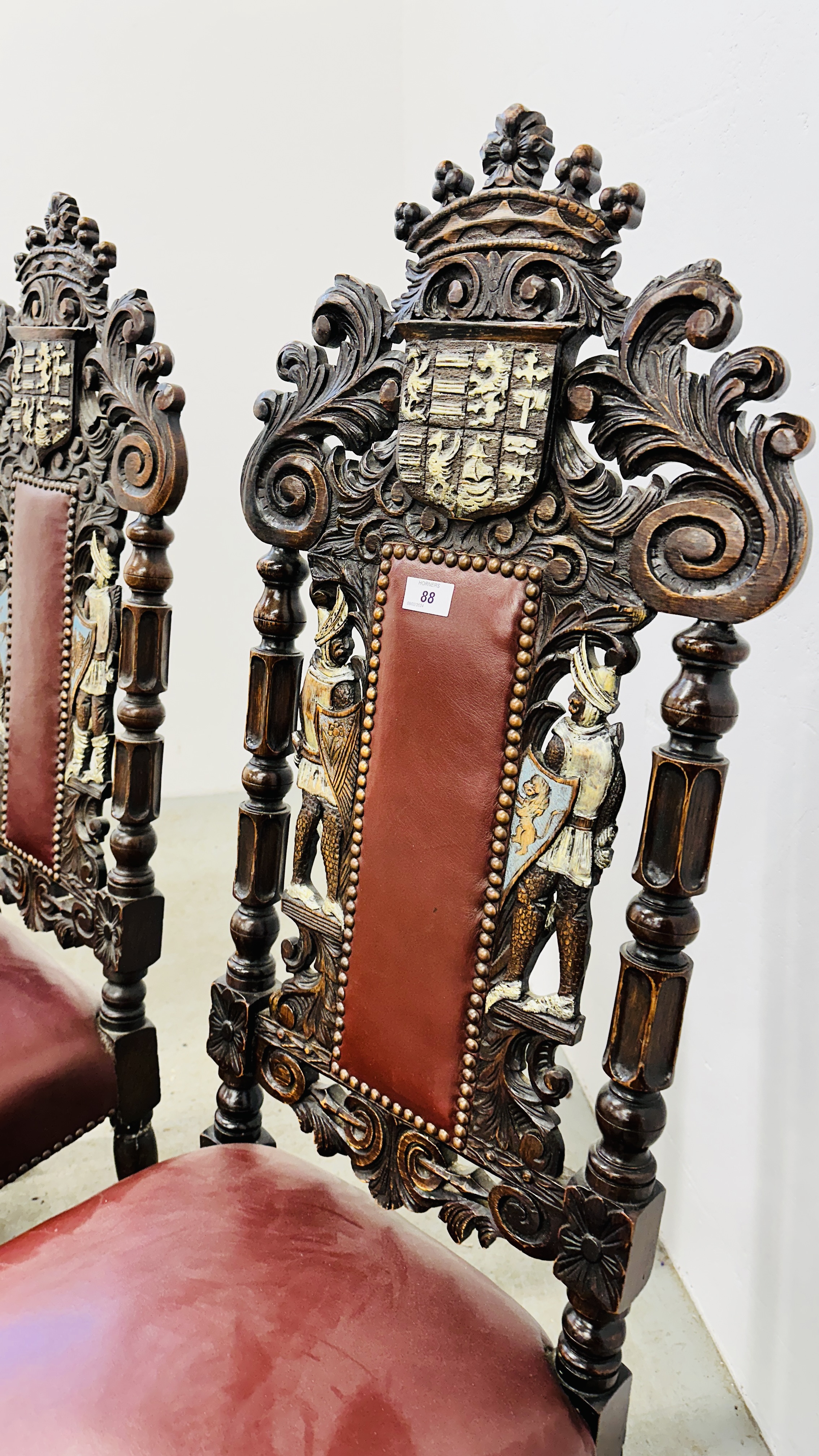 A SET OF 4 OAK FRAMED DINING CHAIRS WITH HEAVILY CARVED DETAIL BEARING CREST AND TWO KNIGHTS, - Image 4 of 12