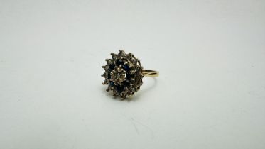 A 9CT GOLD SAPPHIRE AND DIAMOND SET CLUSTER RING SIZE S/T.