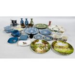 A LARGE GROUP OF WEDGEWOOD TO INCLUDE CUPS AND SAUCERS, PLATES, CANDLESTICK HOLDERS ETC.