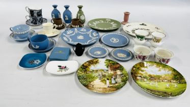 A LARGE GROUP OF WEDGEWOOD TO INCLUDE CUPS AND SAUCERS, PLATES, CANDLESTICK HOLDERS ETC.
