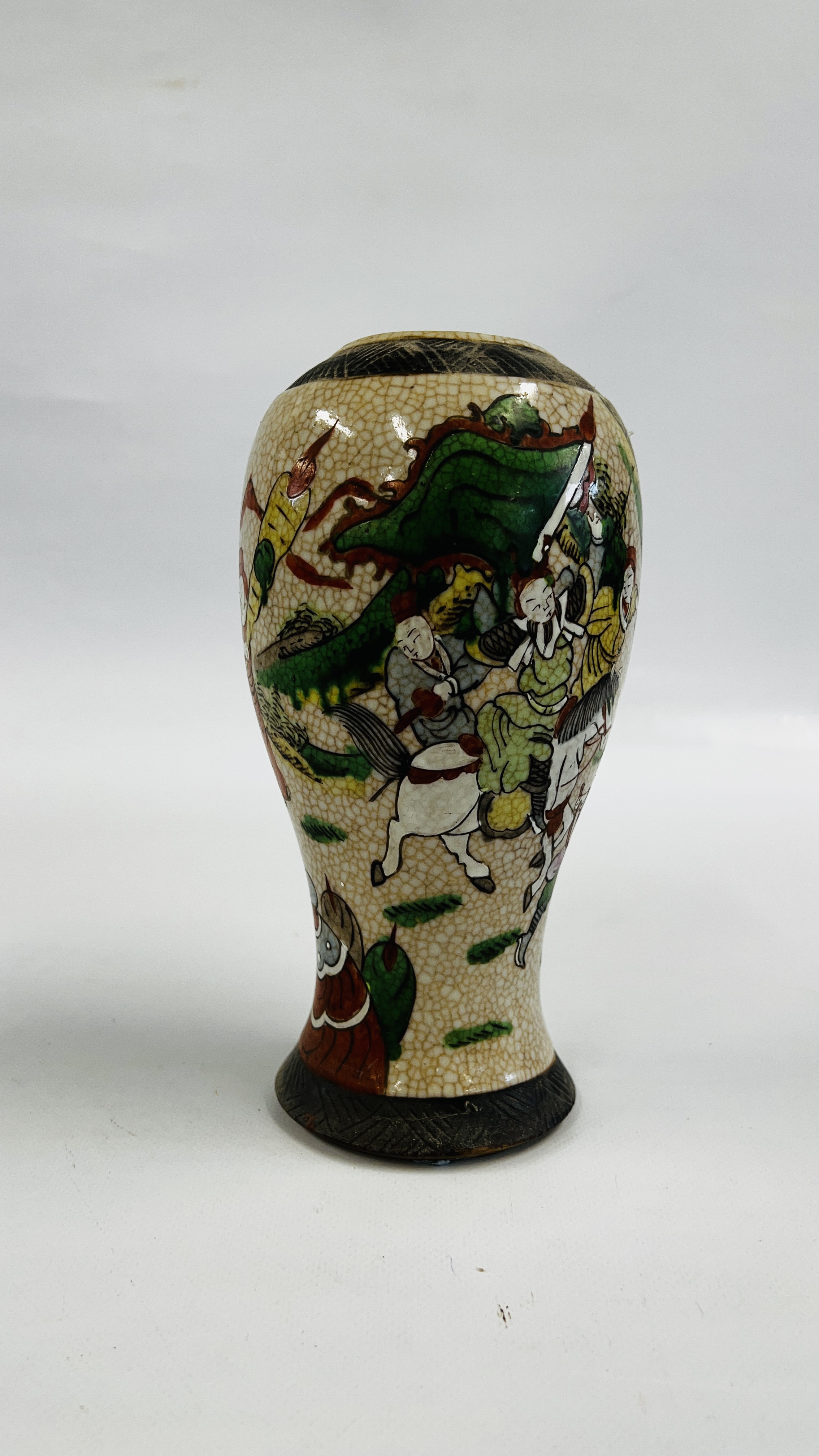 A CHINESE NANJING STYLE CRACKLED GLAZED VASE DECORATED WITH CHARACTERS AND WARRIORS UPON HORSEBACK