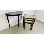 A NEST OF THREE REPRODUCTION LEATHER TOP TABLES AND A DEMI LOOM HALL TABLE.