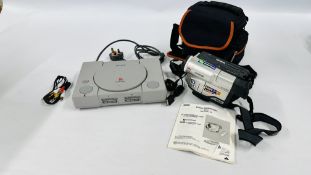A SONY PLAYSTATION 1 CONSOLE MODEL No: SCPH-5552 ALONG WITH A SAMSUNG 8MM COLOUR LCD VIDEO
