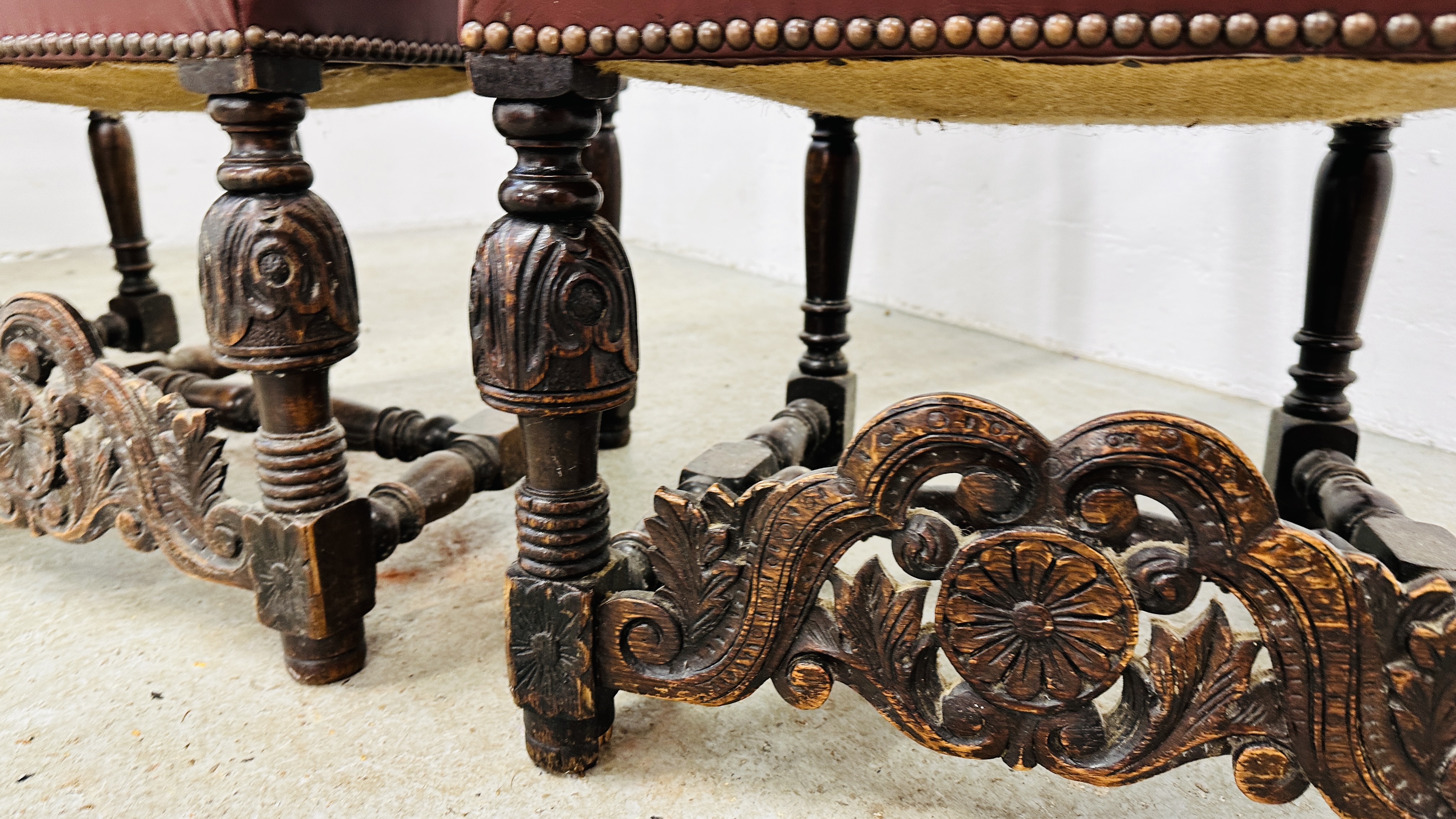 A SET OF 4 OAK FRAMED DINING CHAIRS WITH HEAVILY CARVED DETAIL BEARING CREST AND TWO KNIGHTS, - Image 9 of 12