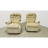 A PAIR OF GOOD QUALITY FAWN UPHOLSTERED RECLINING EASY CHAIRS.