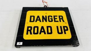 VINTAGE ENAMEL SIGN "DANGER ROAD UP" MOUNTED ON A WOODEN PLAQUE.