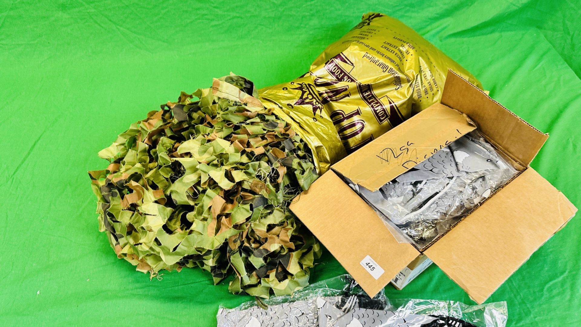 TWO CAMOUFLAGE NETS + A BOX OF AS NEW FABRIC PIGEON DECOY OVER SOCKS. - Image 6 of 7