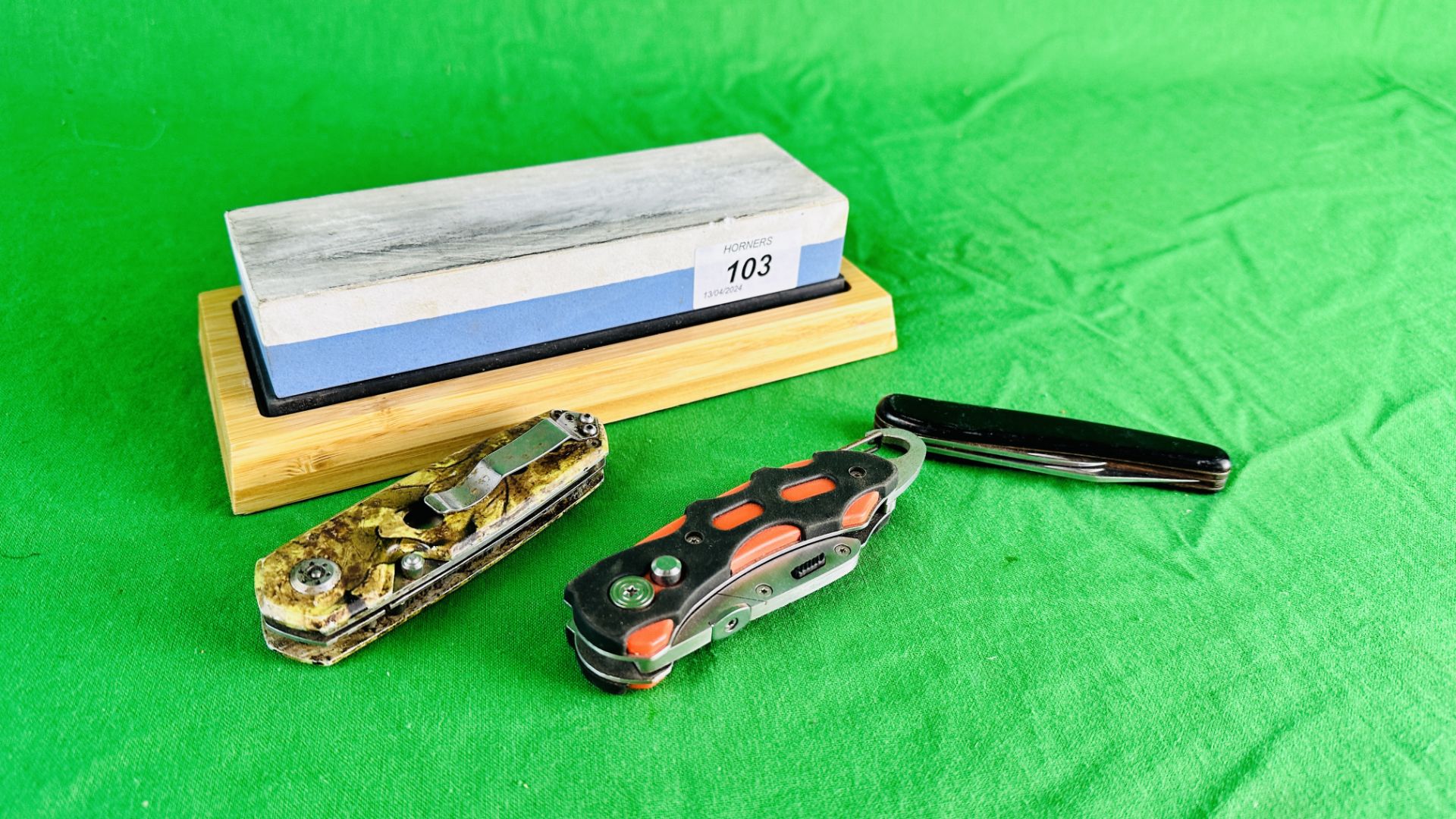 GROUP OF THREE FOLDING POCKET KNIVES AND SHARPENING BLOCK - NO POSTAGE OR PACKING AVAILABLE