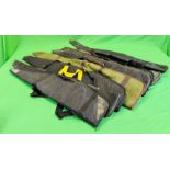 A GROUP OF EIGHT VARIOUS GUN SLIPS - GREEN AND BLACK CANVAS