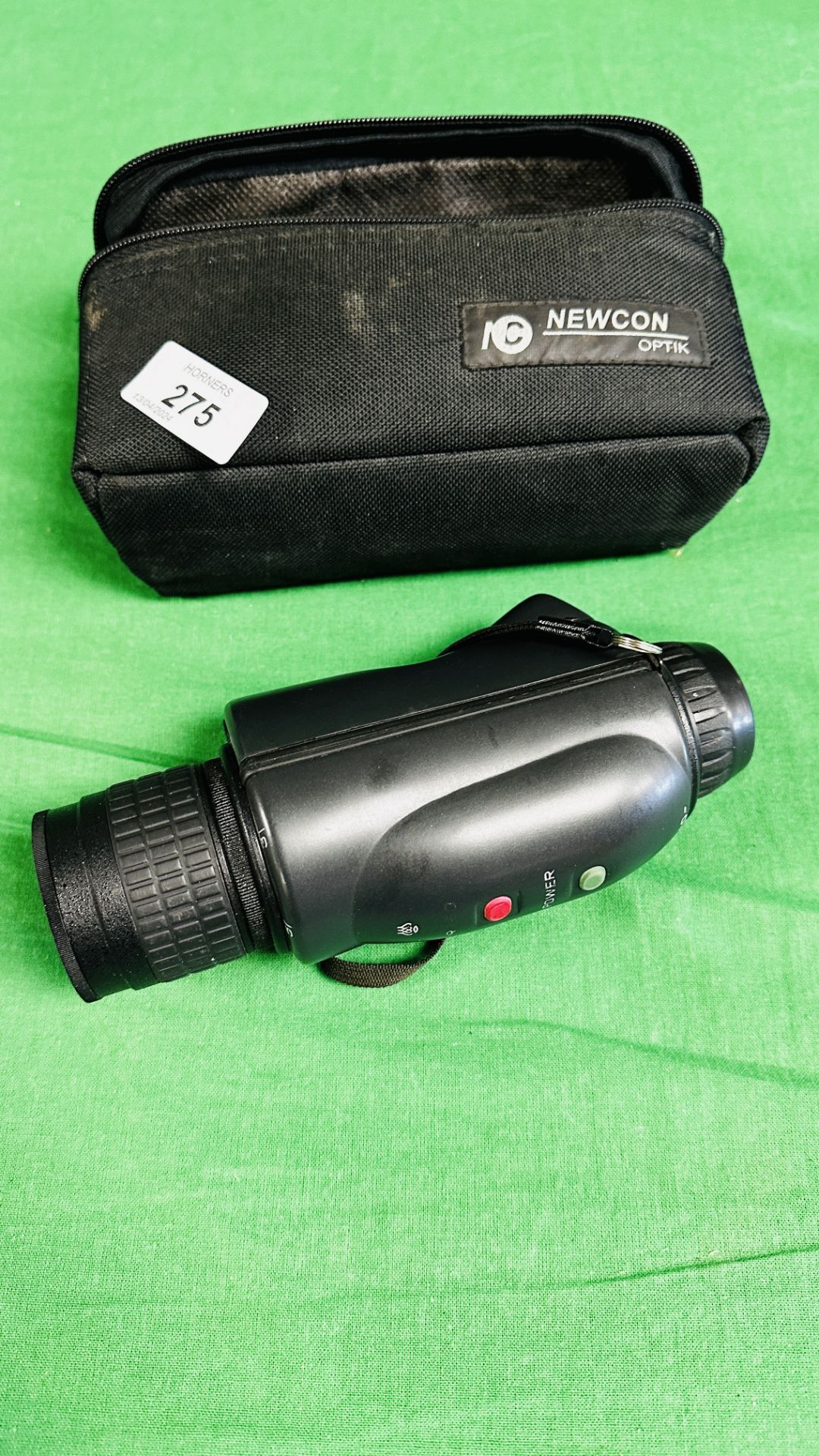 A NEWCON NIGHT VISION SCOPE IN CASE.