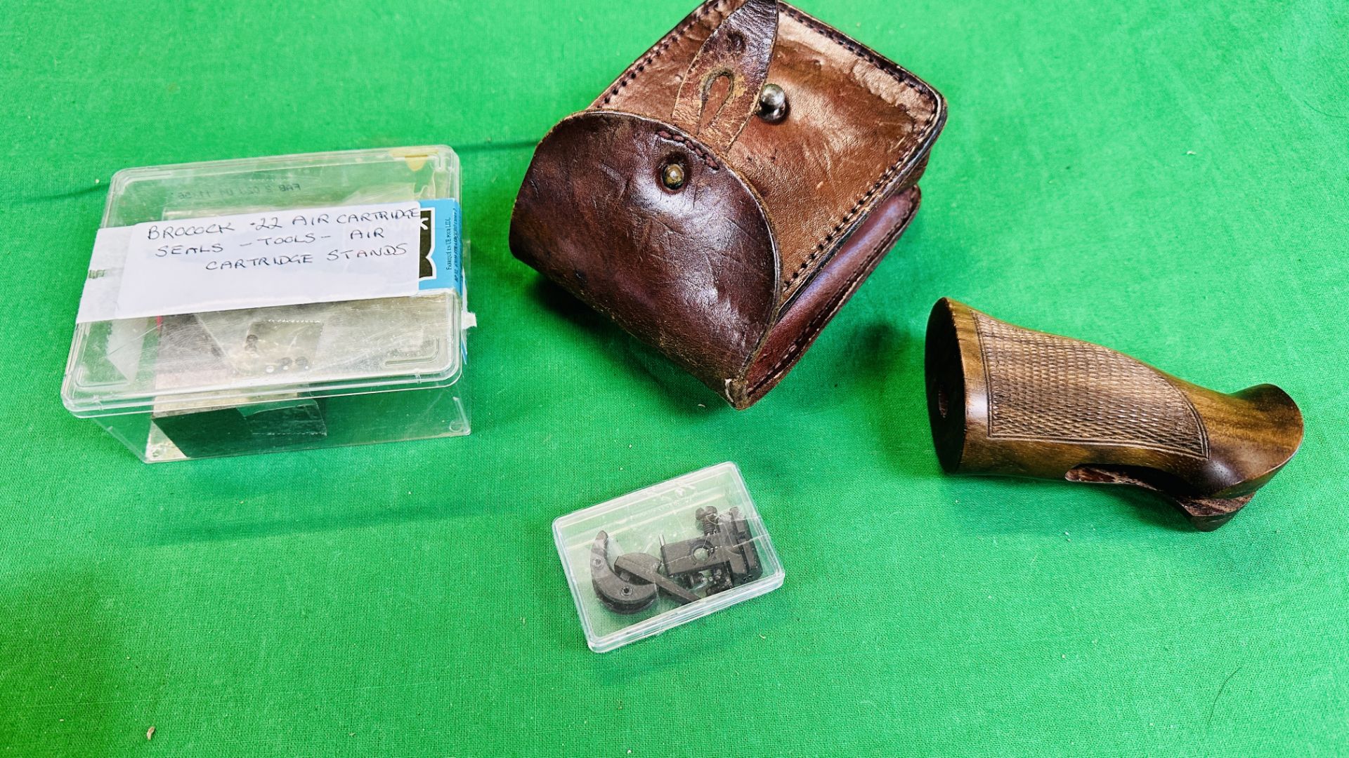 A GROUP OF BROCOCK ITEMS TO INCLUDE PISTOL GRIP, SIGHT, TRIGGER, SEALS, AIR CARTRIDGES,