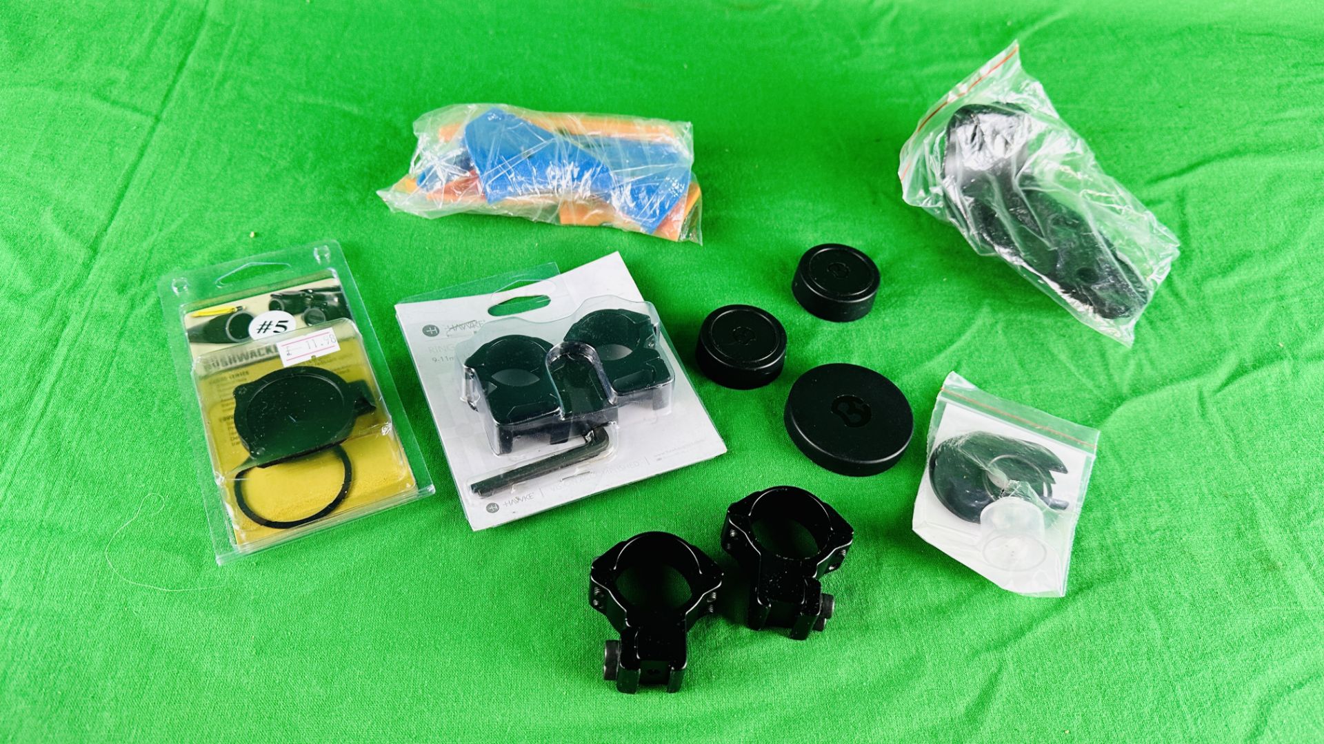 GROUP OF AIR RIFLE ACCESSORIES TO INCLUDE TWO SETS OF SCOPE RING MOUNTS, SCOPE LENS COVERS,
