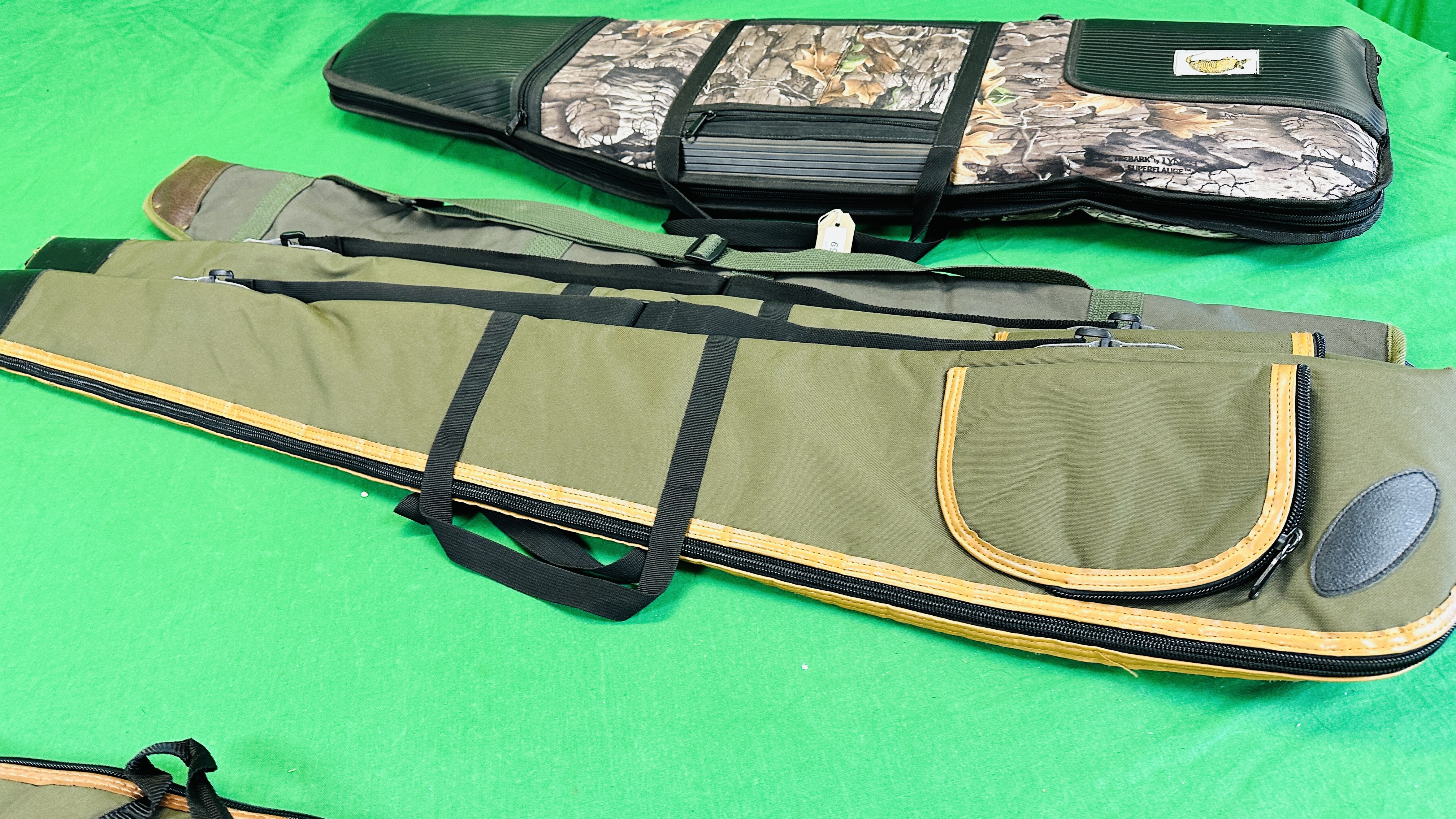 SIX CANVAS GUN SLIPS TO INCLUDE PADDED GUN GEAR PRODUCTS CAMO SLIP. - Image 7 of 9