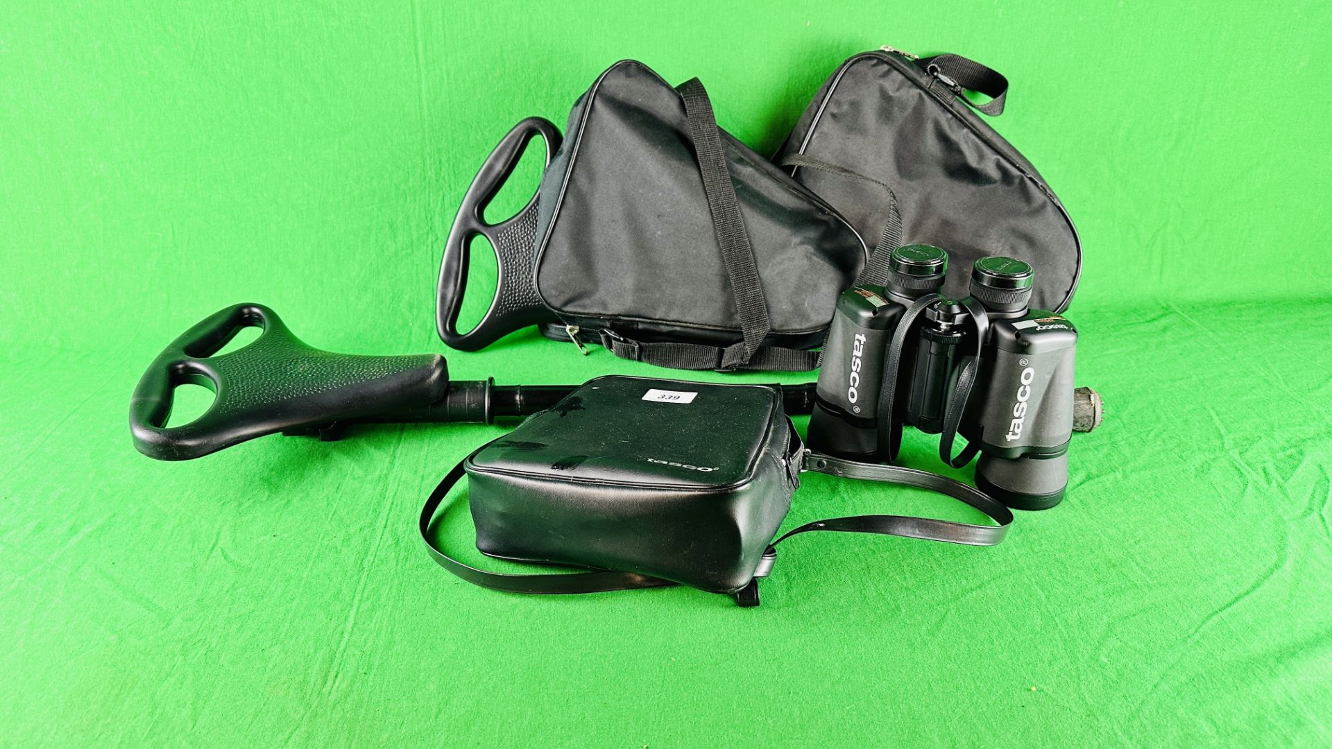 A PAIR OF TASCO 15-20X50RB BINOCULARS CASED,