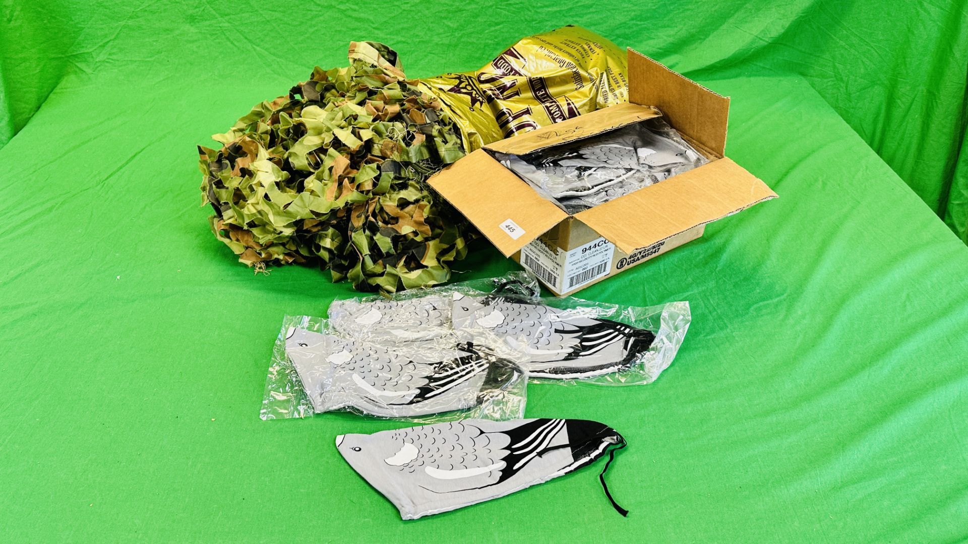 TWO CAMOUFLAGE NETS + A BOX OF AS NEW FABRIC PIGEON DECOY OVER SOCKS.