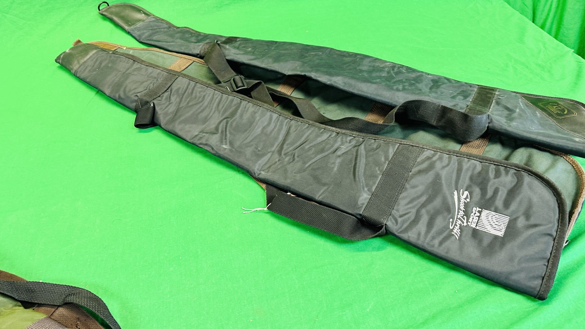 A GROUP OF EIGHT VARIOUS GUN SLIPS - GREEN AND BLACK CANVAS - Image 7 of 9
