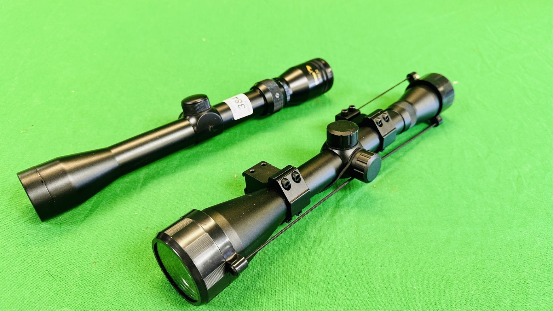 TWO AIR RIFLE SCOPES TO INCLUDE GAMO 3-9X32 AND ANOTHER UNMARKED 4X40 SCOPE.