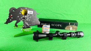 A KNOCK DOWN HOG TARGET & RIFLE SCOPE WITH MOUNTS