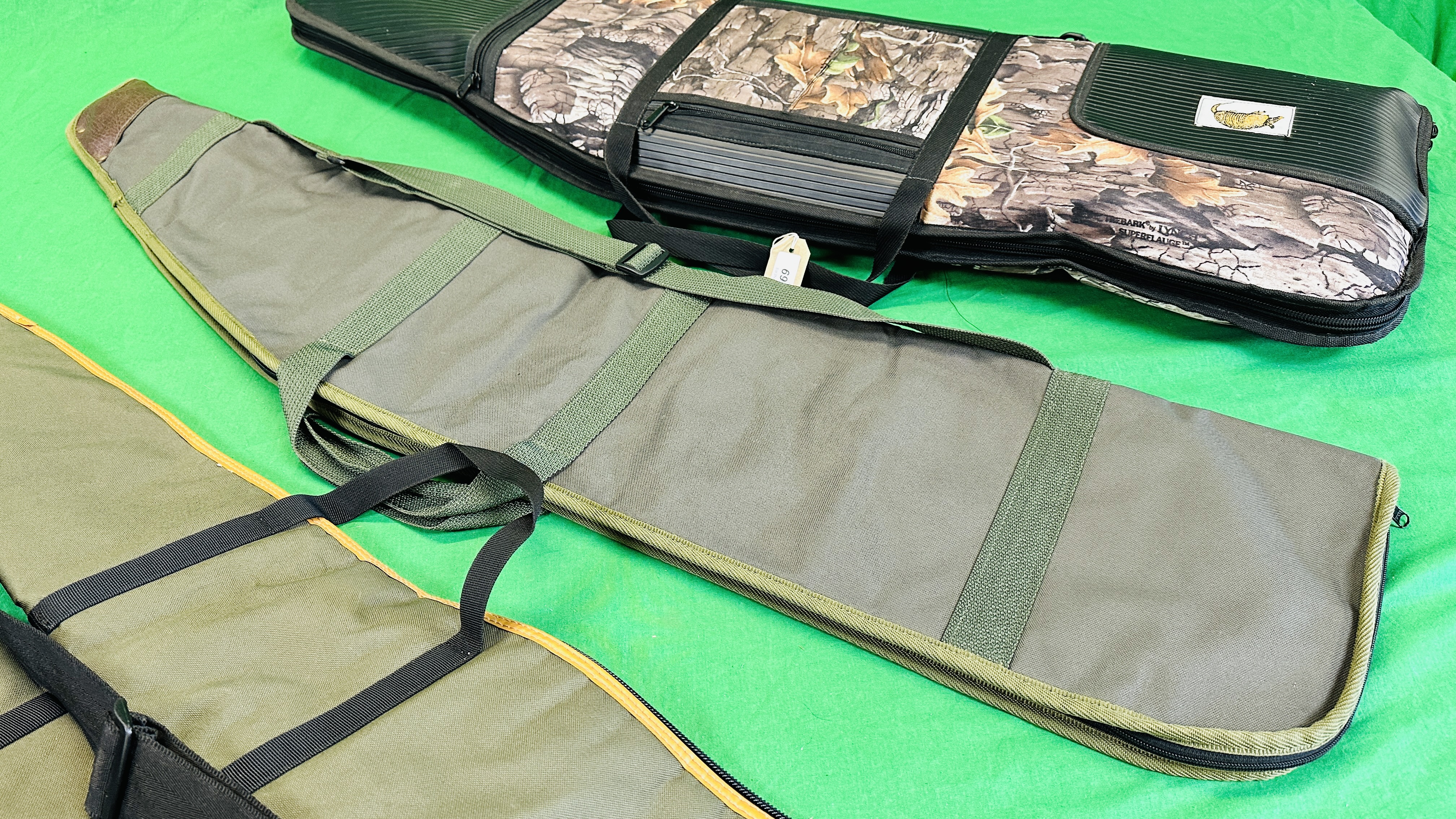 SIX CANVAS GUN SLIPS TO INCLUDE PADDED GUN GEAR PRODUCTS CAMO SLIP. - Image 9 of 9