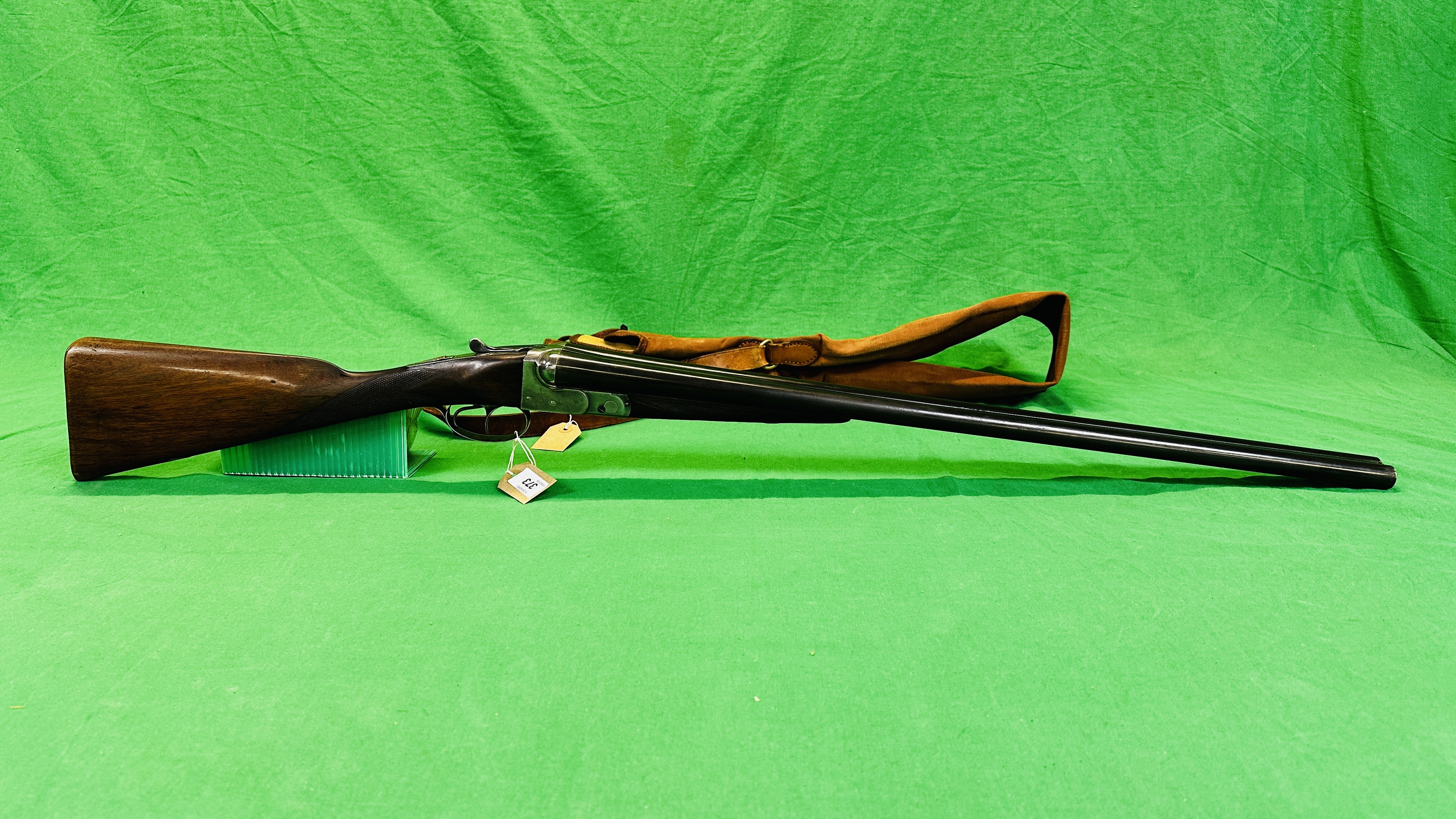 A BSA SIDE BY SIDE 12 BORE SHOTGUN,