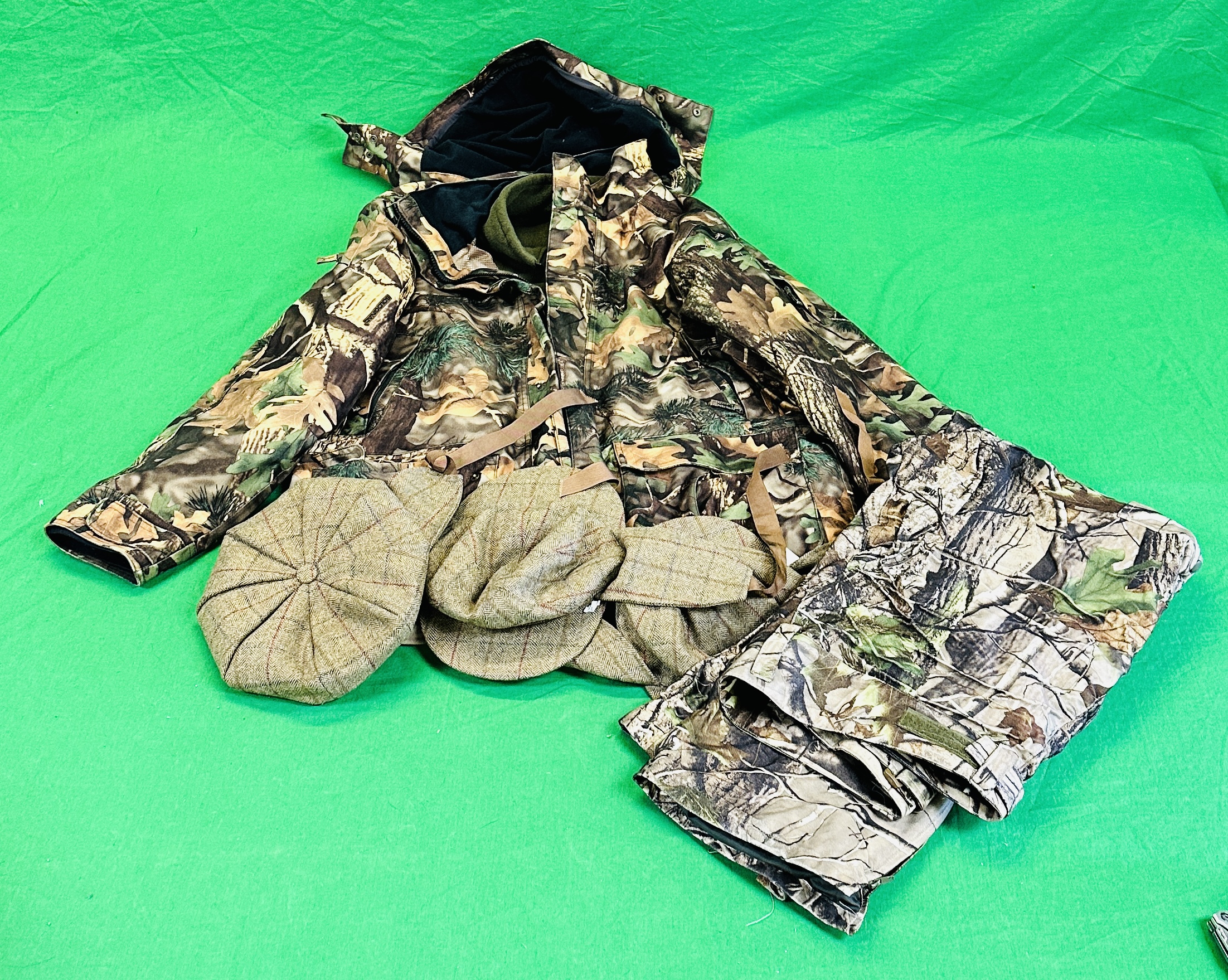 A SOLOGNAC XXL 3 IN 1 CAMOUFLAGE SHOOTING COAT ALONG WITH A PAIR OF MERGER XL CAMOUFLAGE TROUSERS