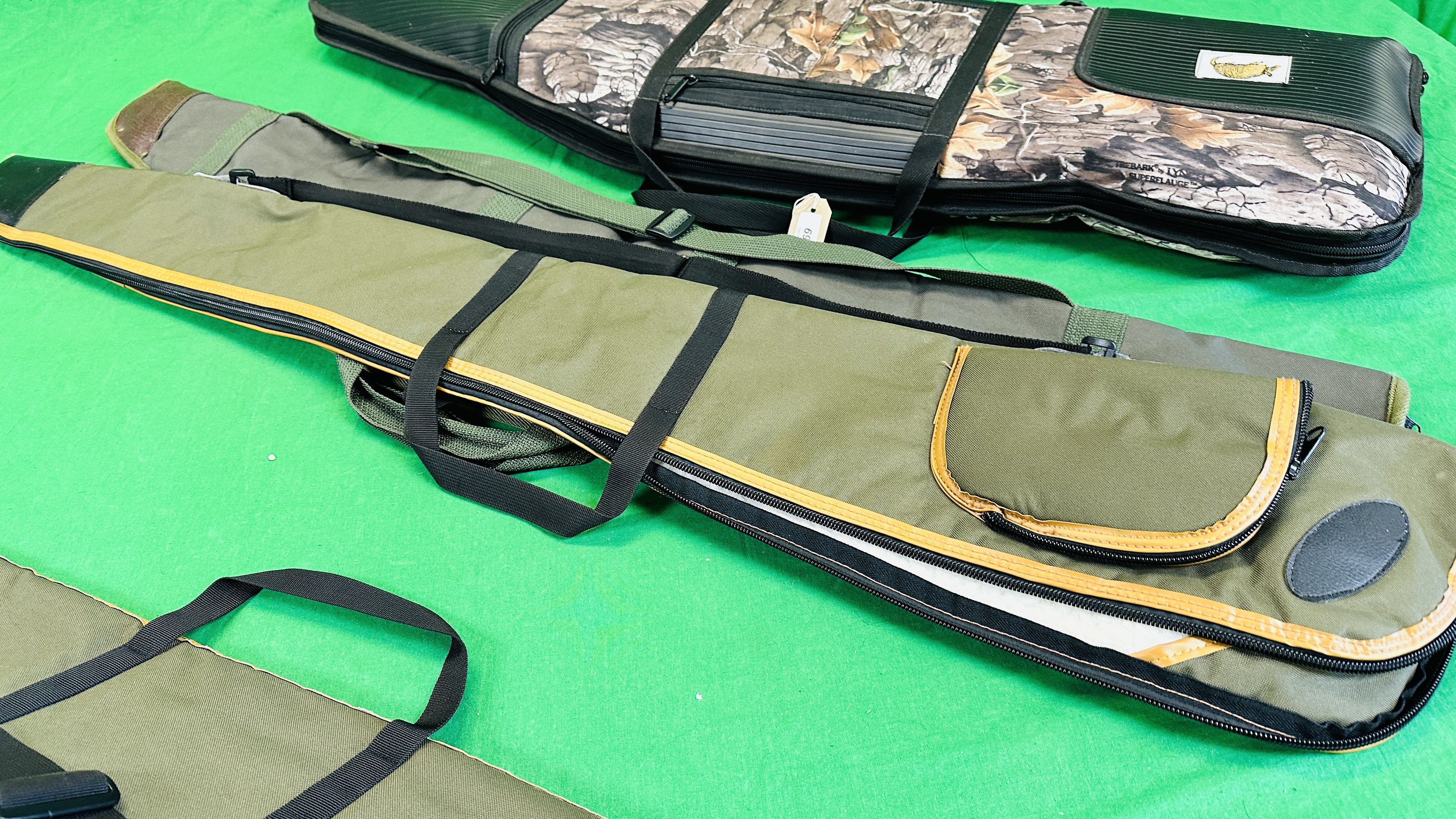 SIX CANVAS GUN SLIPS TO INCLUDE PADDED GUN GEAR PRODUCTS CAMO SLIP. - Image 8 of 9