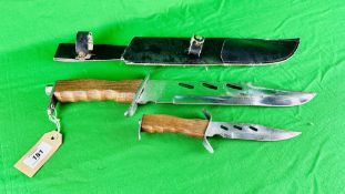 A LARGE HUNTING KNIFE,