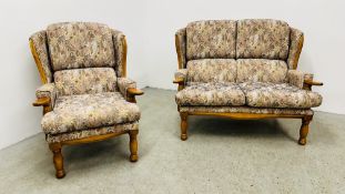 MODERN BEECH FRAMED TWO PIECE SUITE UPHOLSTERED IN FLORAL.
