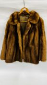 A VINTAGE LADIES FUR COAT.