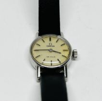 A LADIES WRIST WATCH MARKED OMEGA DE VILLE.