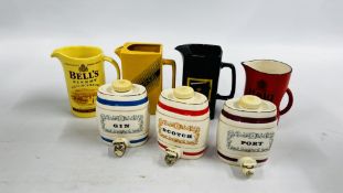 A GROUP OF FOUR PUB ADVERTISING JUGS TO INCLUDE CARLTON WARE HAIG, WADE J.