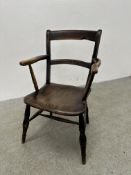 AN ANTIQUE ELM WOOD SEATED ELBOW CHAIR A/F CONDITION.