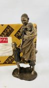 A MAASAI SCULPTURE "BIBI" IN GRANDMOTHERS CARE BOXED WITH CERTIFICATE.