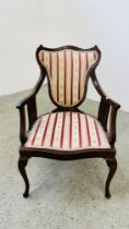 ANTIQUE MAHOGANY ARM CHAIR WITH STRIPED AND FLORAL UPHOLSTERY.